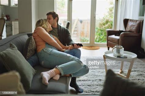 Young Couple Making Out On Couch Bildbanksfoton Och Bilder Getty Images