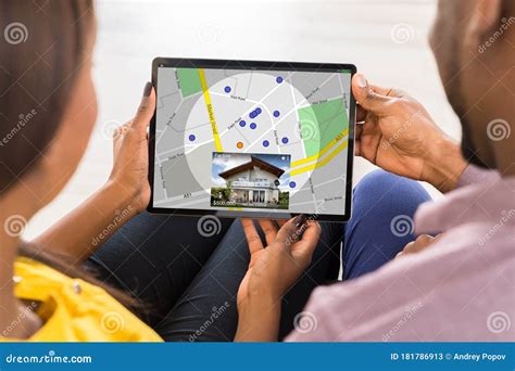Couple Searching for Real Estate Online Stock Image - Image of black