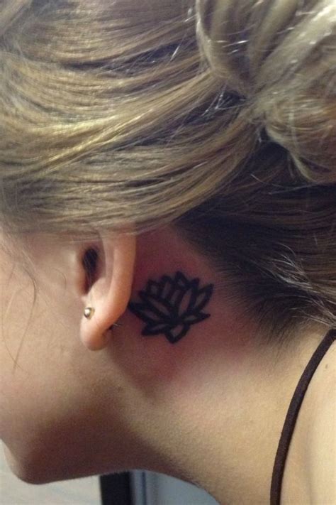 Lotus Flower Tattoo Behind My Ear As A Lotus Is Able To Emerge From