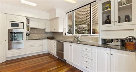 You're insane, those cabinets were perfect before. Why Kitchen Resurfacing is a Great Option - Service Doctor ...