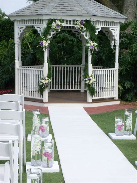 celebration country club s beautiful gazebo decorated with lush foliage garland and floral