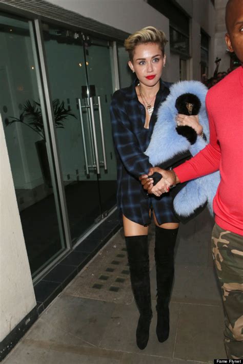 Miley Cyrus Skips Pants Wears Thigh High Boots Instead Huffpost
