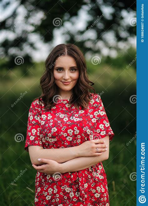 Portrait Of Beautiful Woman In Red Dress Female Outdoors Stock Image