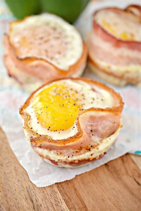 Eggs And Ham Are On Top Of Some Bread