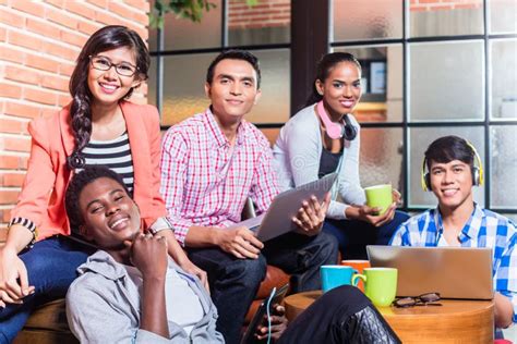 Group Of Diversity College Students Learning On Campus Stock Image