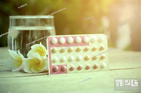 Oral Contraceptive Pills Education Wth Triphasic Pills Regimen On Natural Green Background