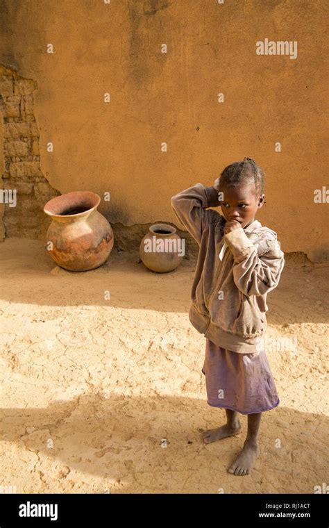 Samba Village Yako Province Burkina Faso A Young Girl Watches