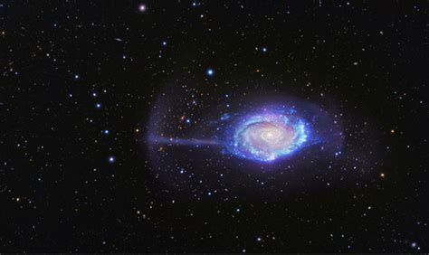 Cosmic Cannibalism The Surprising Eating Habits Of The Umbrella Galaxy
