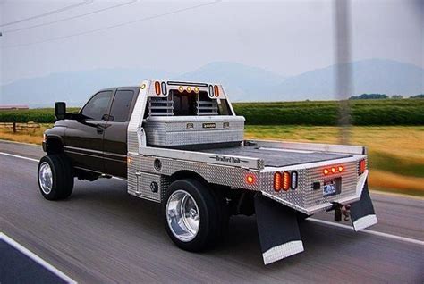 Lifted 2nd gen Ram club cab flatbed dually work rig | Truck flatbeds