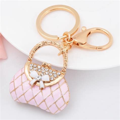 ปักพินในบอร์ด Handbag Keychain Products