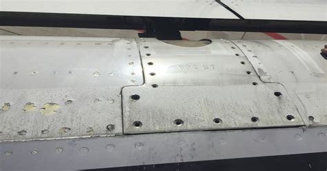 Frontier Jet Flies With Missing Screws On Wing