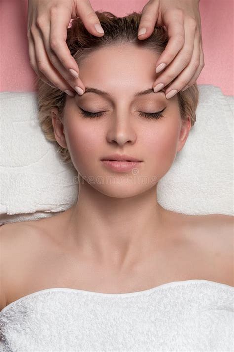 Young Woman Receiving Facial Massage Stock Image Image Of Hands Medicine 67824365