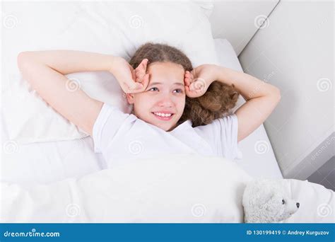 Girl In White Bed Smiling Waking Up Early In The Morning Stock Image Image Of Brunette