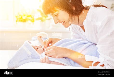 Mother Drying Her Baby After Bathing Stock Photo Alamy