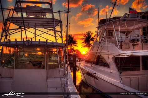 Sunset Between Two Yachts At Riverwalk Marina Jupiter Florida Royal