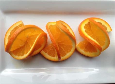 How To Make A Fancy Double Orange Twist Garnish Canadian Living