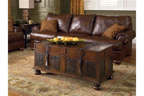 This asian coffee table is a simple design with a beautiful walnut finish. McKenna Coffee Table With Storage | Ashley Furniture ...