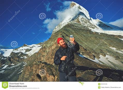Hiker Making Selfie At The Top Of A Pass On The Matterhorn Mount