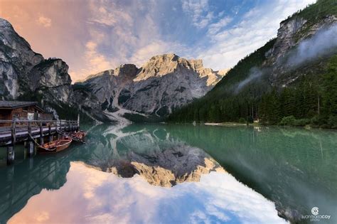 Dawn Reflections On The Waters Of Lake Braies Prags Bolzano Italy