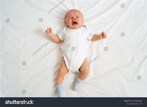 Newborn Baby Cries On White Sheet Stock Photo 2093568406 Shutterstock