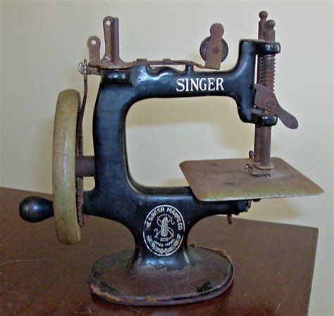 vintage antique singer miniature sewing machine salesman