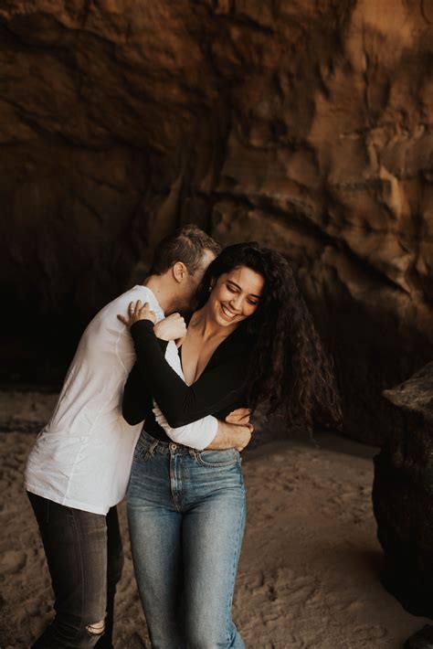Playful And Cute Engagement Session On Laguna Beach California Warm And Moody Tones For