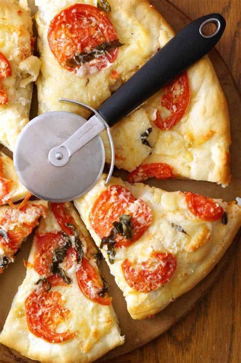 Homemade margherita pizza is a light, fresh pizza with olive oil, garlic, fresh tomatoes, basil, ricotta and mozzarella cheeses. Top Requested Margherita Pizza - Smart Nutrition