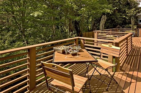 The smaller vertical support posts are cut in an angular. Horizontal Deck Railing Embraces Every Outdoor Living with ...