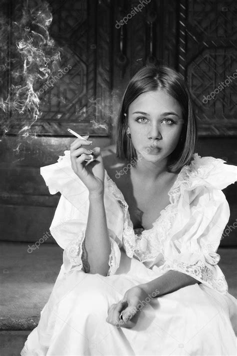 Beautiful Woman In Dress Smoking — Stock Photo © Krivenko 3780115