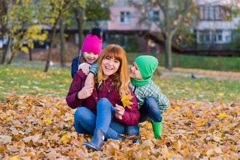 Happy Mother With Kids During Autumn Walk Stock Photo Image Of