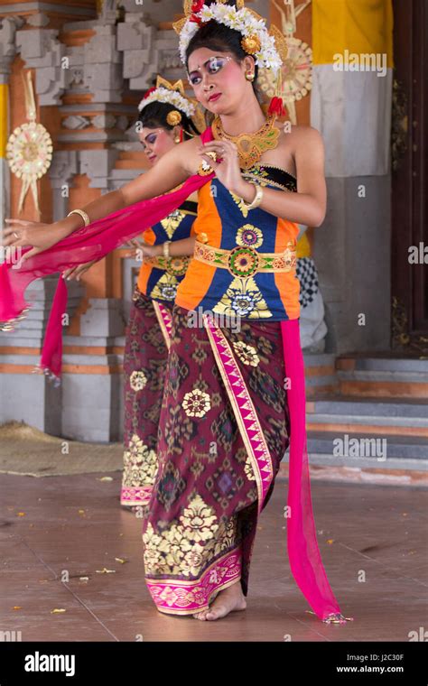 Indonesia Bali Girls Dressed In Traditional Dancing Costume Legong Dancers With Frangipani
