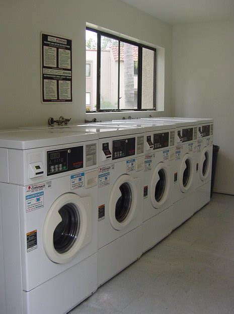 Indeed, going laundry shop outside is much cheaper, self service laundry is a bit cheaper but not too significant, i will suggest you to go for normal laundry outside of your hotel and let them do their job while you travel. Self-service laundry - Wikipedia