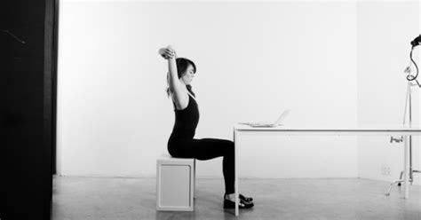 4 Easy Yoga Poses To Practice At Your Desk Mindbodygreen