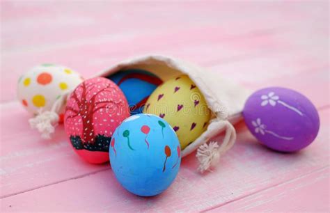 Pastel Hand Painted Easter Eggs With Pink Background Stock Photo