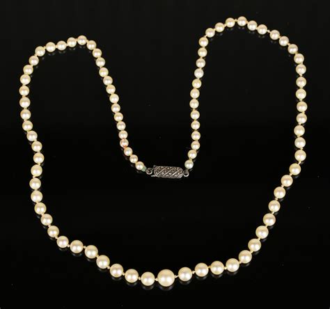A Single Row Necklace Of Graduated Cultured Pearls On A Marcasite Set Silver Clasp