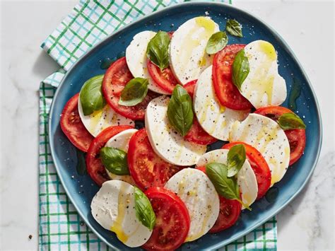I love to prepare it the night before a party so it can marinate in the fridge overnight. Caprese Salad Recipe | Rachael Ray | Food Network