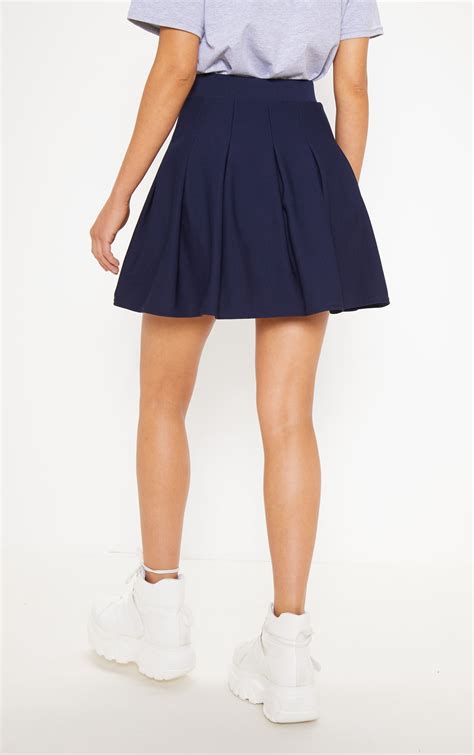 Navy Pleated Tennis Skirt Skirts Prettylittlething Ie