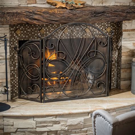 This beautiful iron fireplace screen features art deco touches, including a beautiful central design surrounded by a geometric border. Home Loft Concepts Oxford 3 Panel Iron Fireplace Screen ...