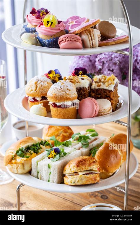 Traditional English Afternoon Tea With Selection Of Cakes And