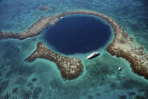 The Great Blue Hole Is A Giant Marine Sinkhole Off The Coast Of Belize