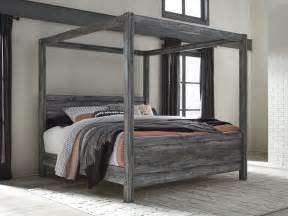 In addition to being attractive, they are. Baystorm Gray King Canopy Bed from Ashley | Coleman Furniture