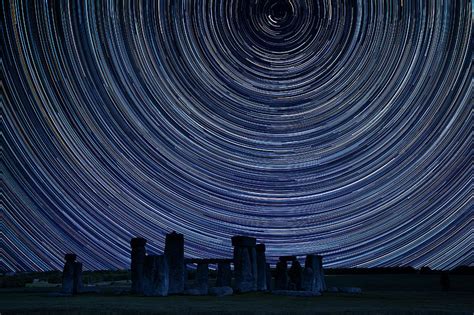Digital Composite Image Of Star Trails Around Polaris With Stone