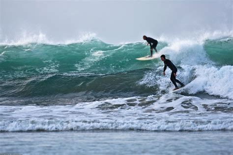 Surfing In The Arctic Circle In Lofoten