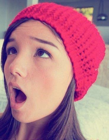 Surprised Woman In Red Knitted Hat
