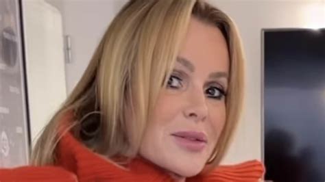 Amanda Holden Accidentally FLASHES Fans As She Lifts Up Her Top While Showing Off Her Outfit