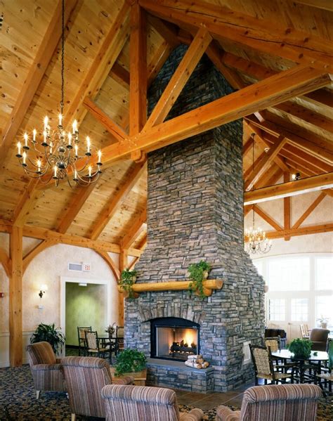 When a vaulted ceiling has a different pitch than the roof planes above, scissor trusses are produced. Come visit our Timber Frame Shop in beautiful Vermont
