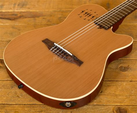 Discover more posts about godin. Godin Multiac encore nylon natural +Gigbag - Peach Guitars