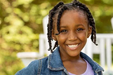 Cute African American Little Girl Stock Photo By ©pixelheadphoto 177384476