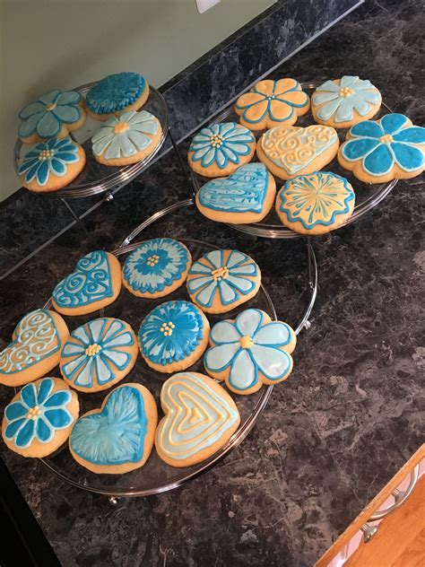 Maybe you would like to learn more about one of these? Blue and yellow flower cookies | Flower cookies, Turquoise ...