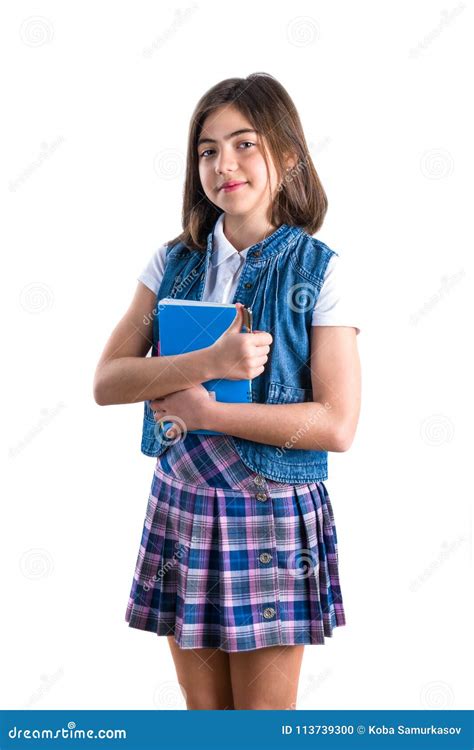 Beautiful Girl In School Uniform With A Notebook In Her Hand On Stock 2c4